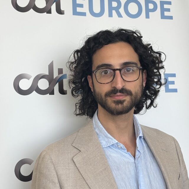 David Klotsonis in front of the CDT Europe banner