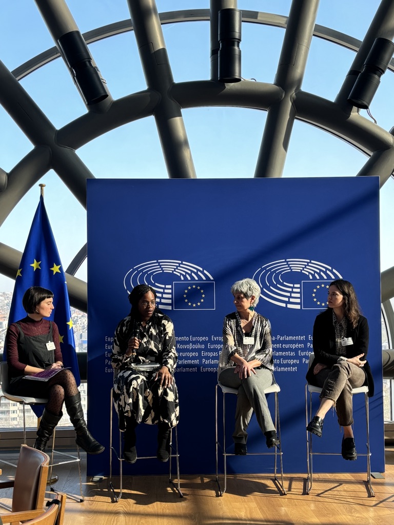 CDT Europe Secretary General Asha Allen speaking at a panel for the “Equality in Digital" event at the European Parliament, organised by MEP Elena Sancho Murillo.