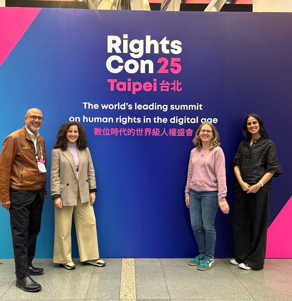 CDT Europe and CDT US Security and Surveillance teams in front of the official RightsCon sign.