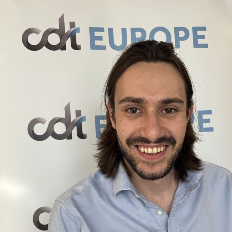 Marcel Mir, smiling in a collared shirt, in front of the CDT Europe backdrop.