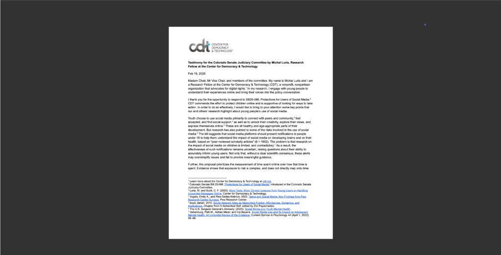 White document on black background.